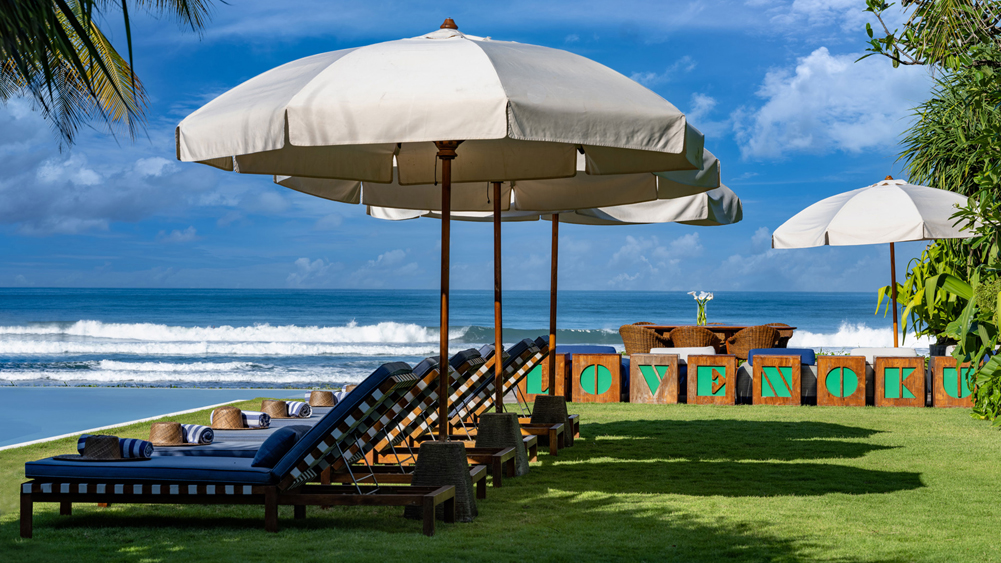 Noku Beach House - Sunbrellas by the pool